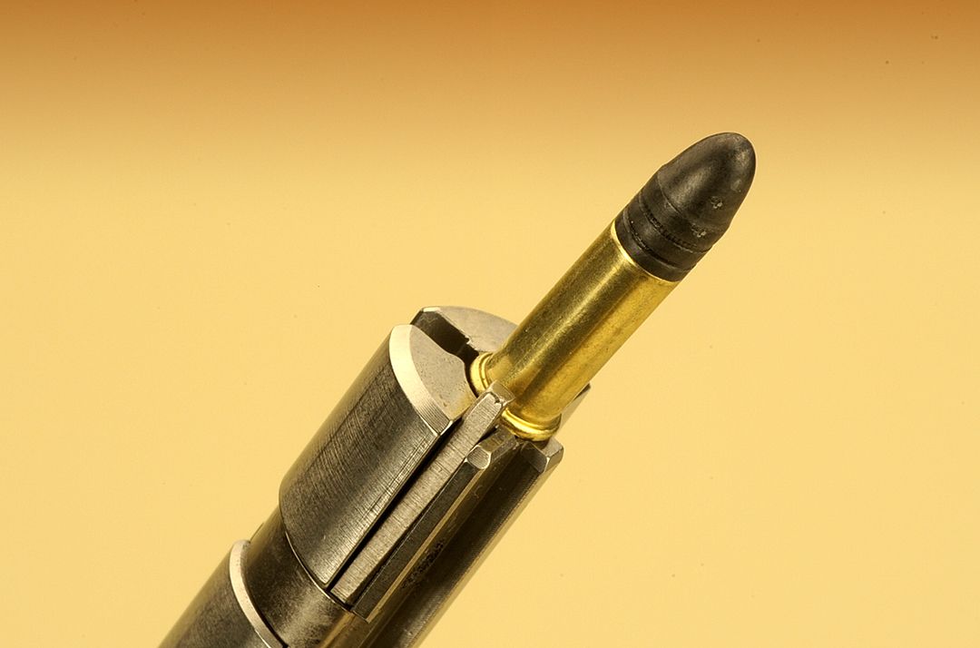 A finely-tuned and finished bolt assures smooth operation in the gun. Dual extractors are standard as shown here with a mechanical ejector installed deep into the rear of the receiver.